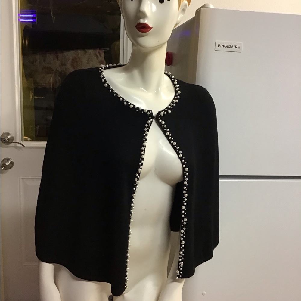 Calvin Klein Jersey Knit Cape-let with Pearl Trim.